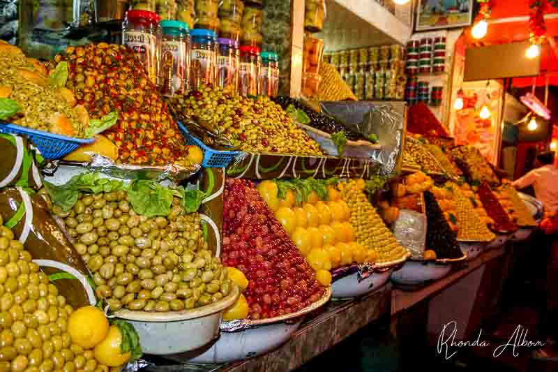 olives and fresh fruit at a souk in Morocco