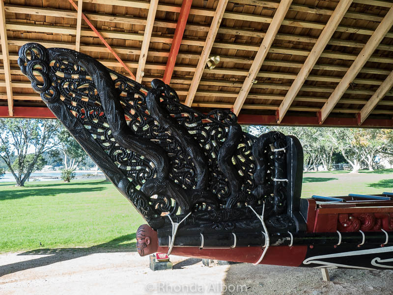 Bow carving of Maori waka at Treaty of Waitangi Grounds in New Zeal