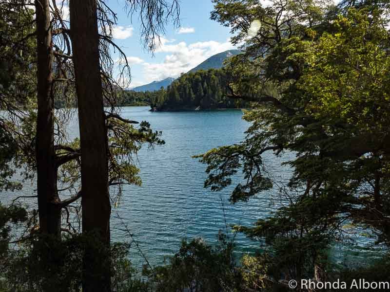 Views of Petito Moreno Lake while hiking on Sendero Arrayanes trail in Bariloche. Walking here is one of our many Argentina travel tips