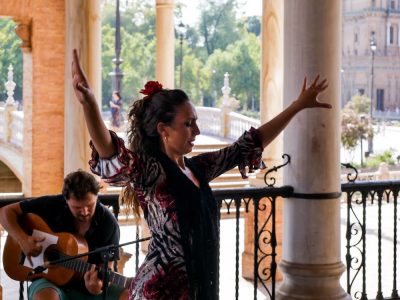 Colourful dancer on the street demonstrating Flamenco in Seville, its birthplace in Spain is