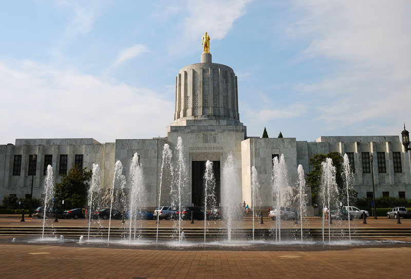 Oregon State Capitol building built in 1938 in Salem Oregon. Atop the marble dome sits the statue 