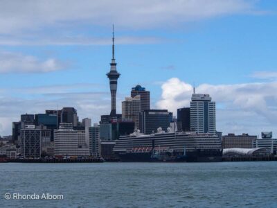 Holland America Oosterdam at the Auckland cruise port, seen from the water.